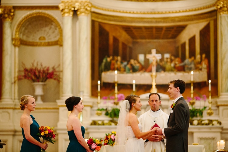 bride and groom exchange vows, St. Cecilia's Boston