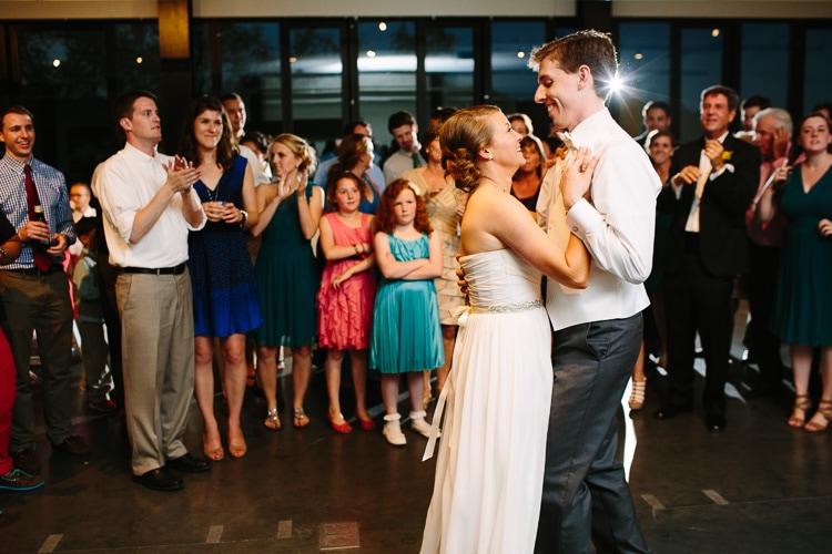 bride and groom dance at wedding reception at Harry Parker Boathouse, Community Rowing
