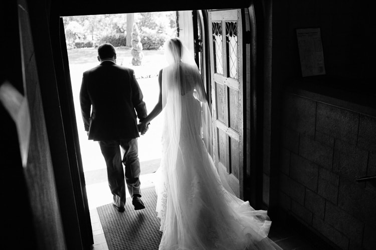 bride and groom leave Chapel following wedding ceremony