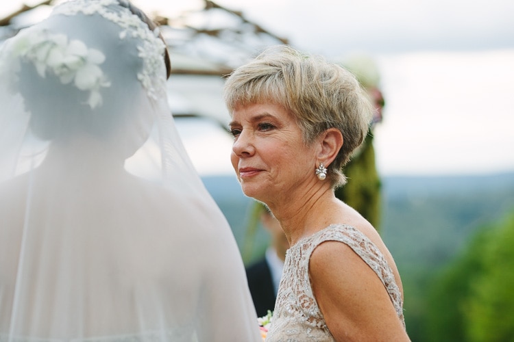 emotional mother of the bride during ceremony