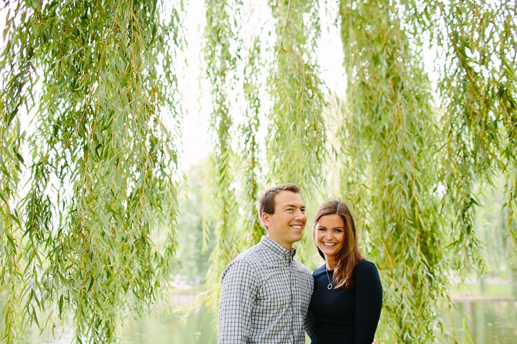 a sweet engagement portrait under the willows in the Boston Public Garden