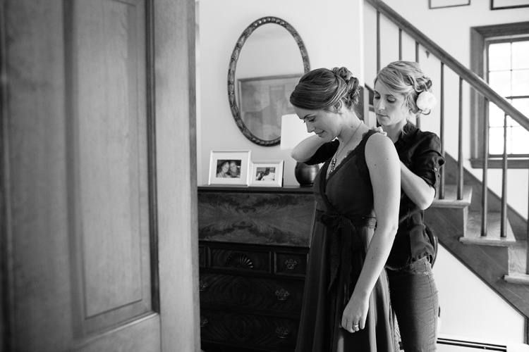 Sisters getting ready at home before the wedding.