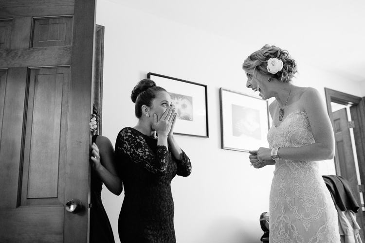 Massachusetts documentary wedding photography, bridesmaid sees bride in dress for first time