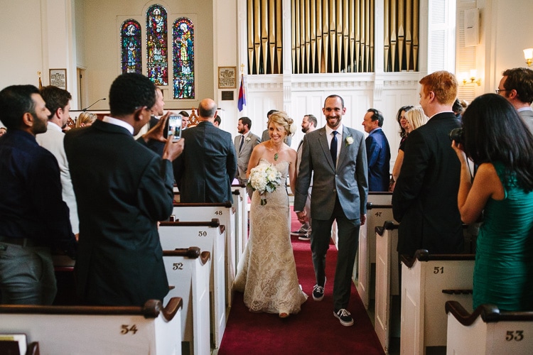 Massachusetts documentary wedding photography, bride and groom recess following the ceremony at the First Congregational Curch, Marion MA