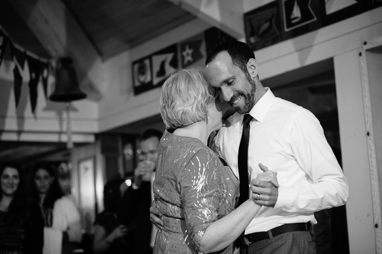 Massachusetts documentary wedding photography, groom dances with mother at the Beverly Yacht Club