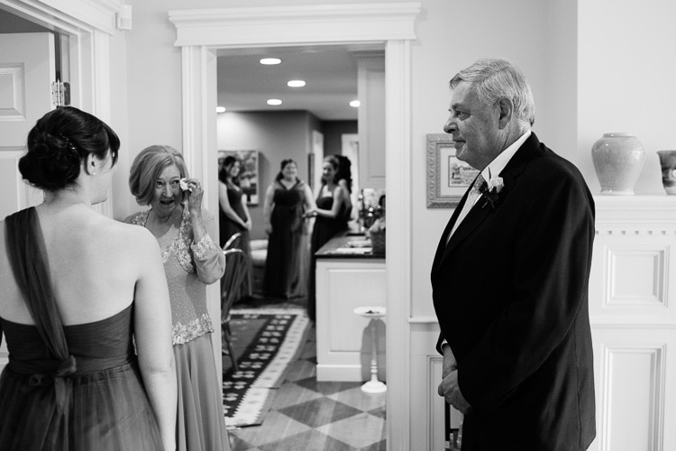 bride's parents react to seeing her in her wedding dress