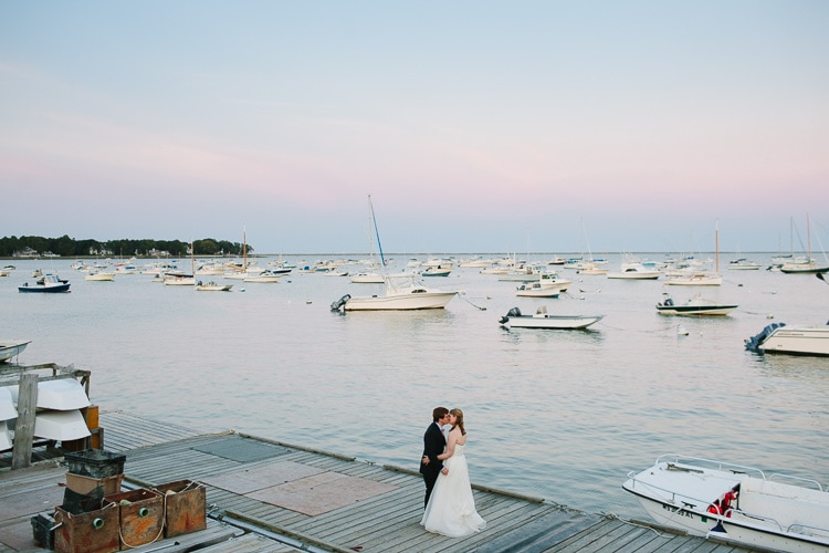 portrait of the bride and groom on the docks of the Duxbury Bay Maritime School