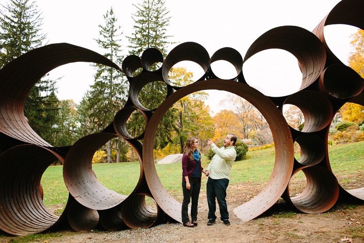candid engagement photograph at the deCordova sculpture park