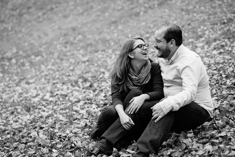 candid fall engagement portrait in black and white