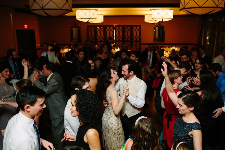 bride and groom dance among friends and family at Hotel Marlowe wedding reception, Cambridge wedding photographer