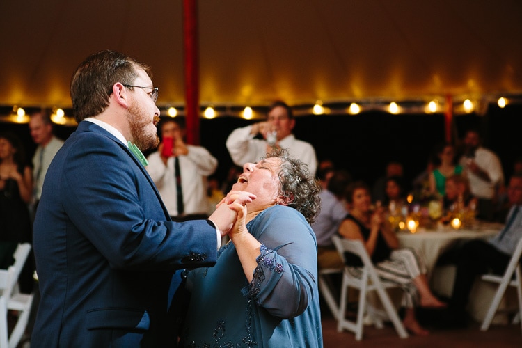 groom dances with mom, photo by Kelly Benvenuto