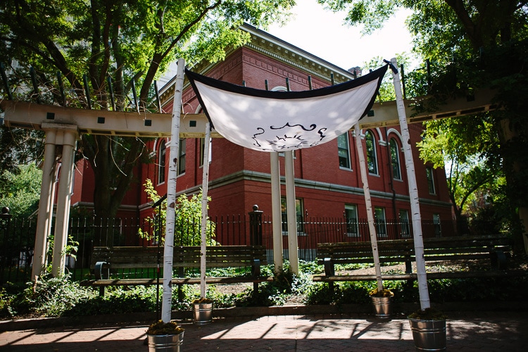 chuppah in the courtyard of the Cambridge Multicultural Arts Center