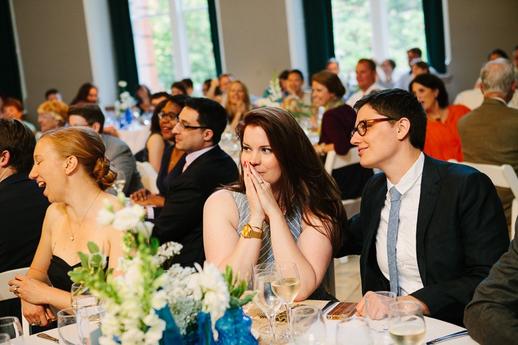 guests react to toast at Cambridge wedding