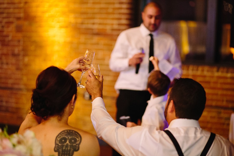 bride and groom raise their glass, Charles River Museum