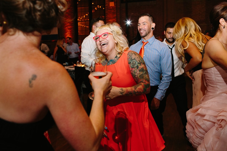 guests dance at wedding reception