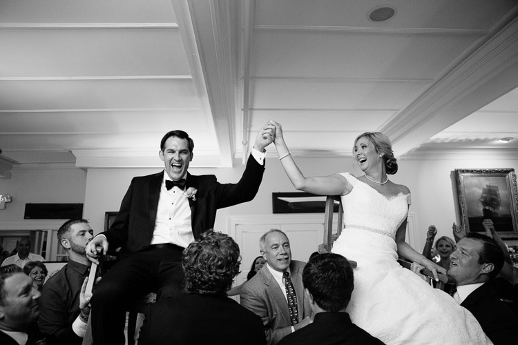 bride and groom lifted in the hora, Corinthian Yacht Club wedding, Marblehead, MA