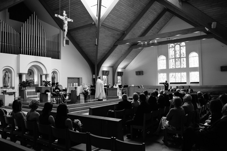 black and white, documentary image of Catholic wedding ceremony