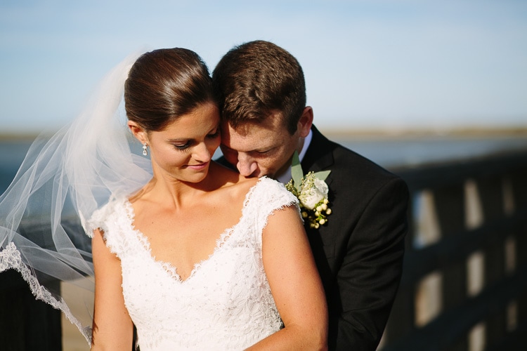 bride and groom on Powder Point Bridge