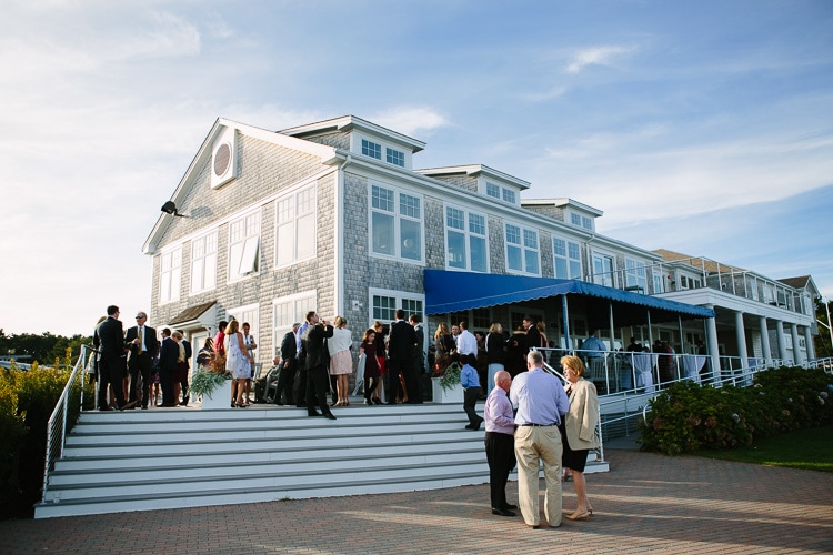 guests enjoy cocktail hour at a Duxbury Bay Maritime School wedding