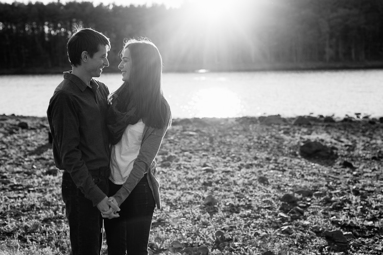Engagement photos in dramatic sunlight at the Middlesex Fells, Stoneham, MA. Photo by Kelly Benvenuto.
