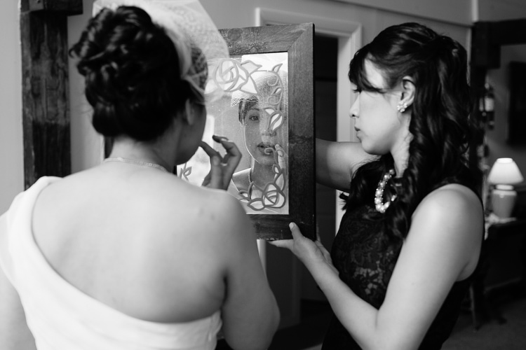 Bride getting ready at Friendly Crossways before her wedding. Honest, documentary wedding photography by Kelly Benvenuto.