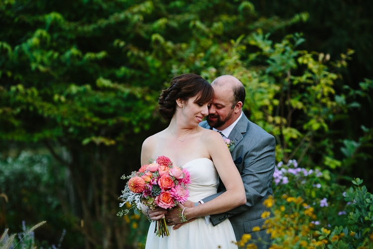 Wedding portrait of bride and groom on the grounds of the Pierce House in Lincoln, MA. Intimate, colorful wedding photography by Kelly Benvenuto, serving Boston, Massachusetts, and New England.