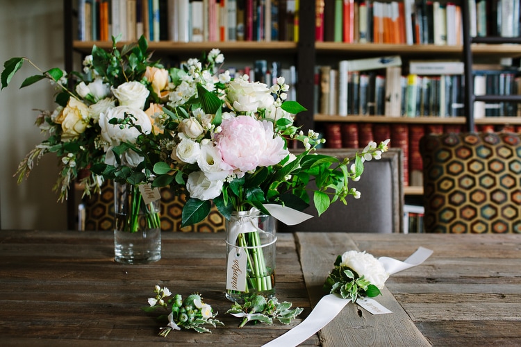 Wedding bouquets and books. Cambridge, Massachusetts wedding photography by Kelly Benvenuto.