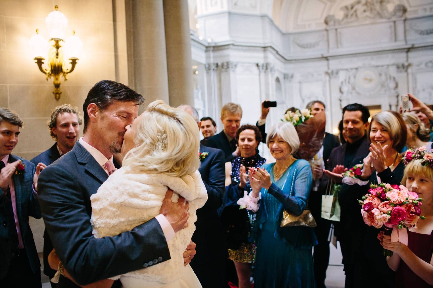 emotional wedding ceremony in the rotunda at San Francisco City Hall