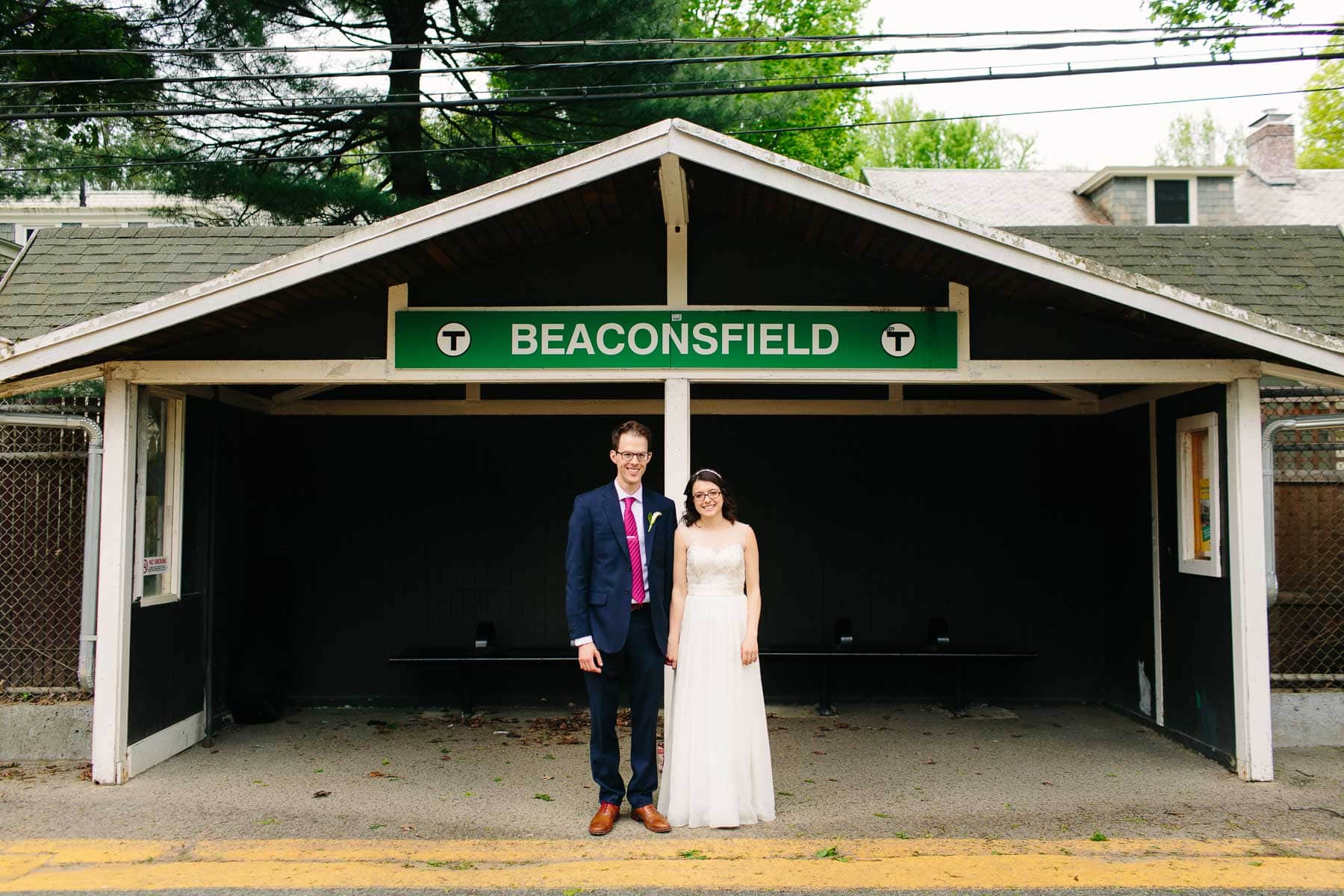 bride and groom pose for a portrait at the Beaconsfield T station