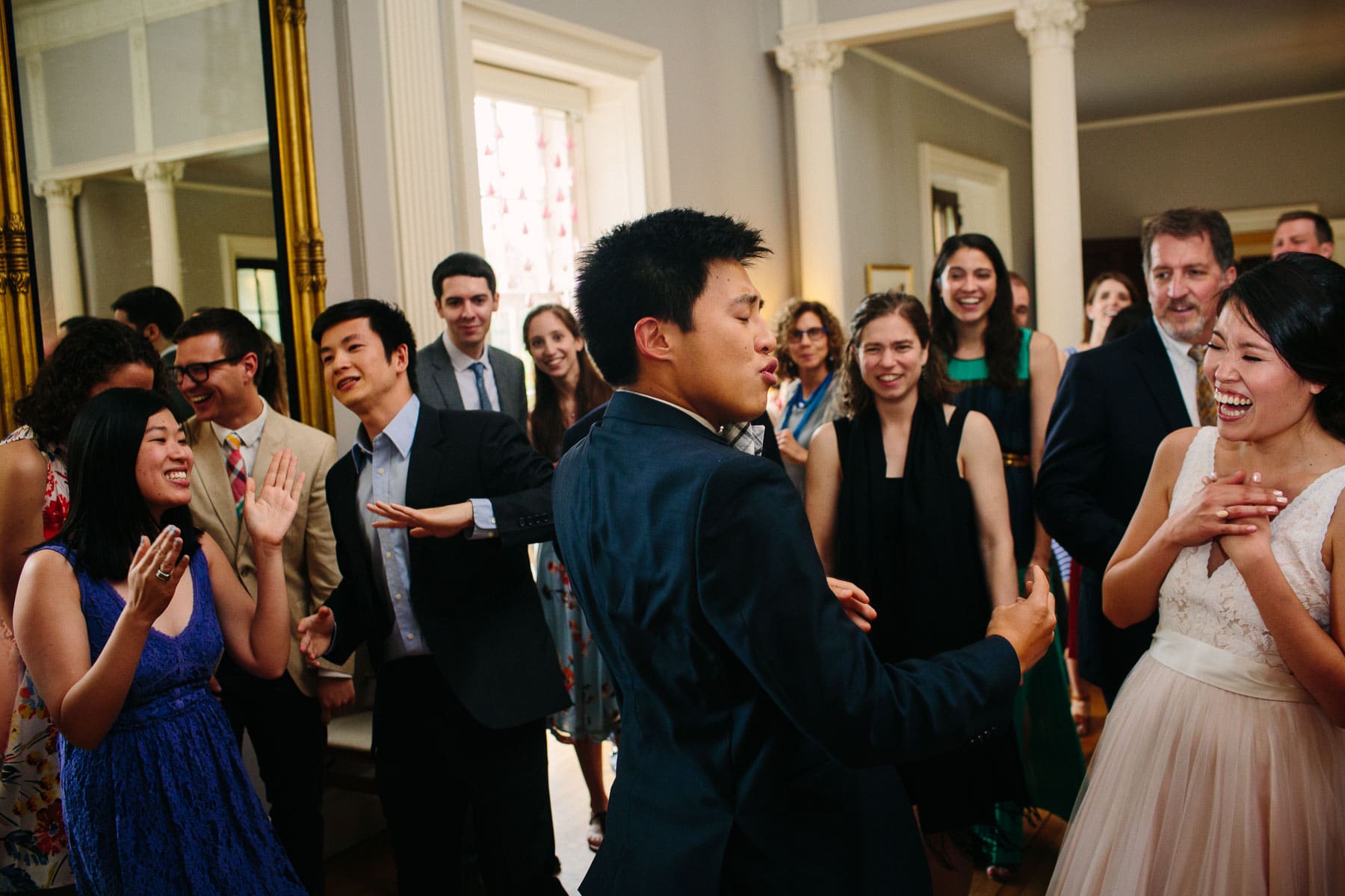 guests dance in the ballroom of the Lyman Estate