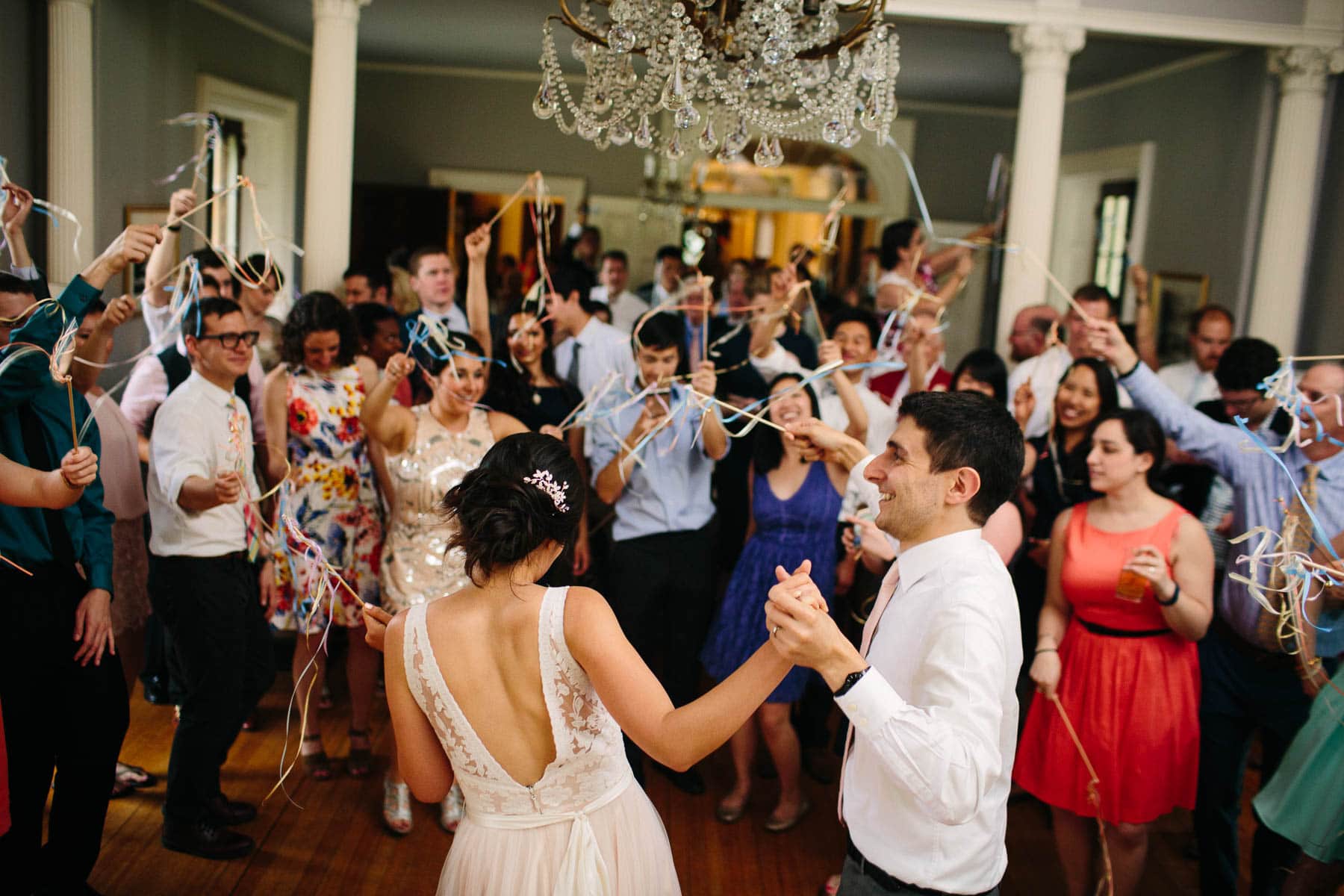 bride and groom dance in the ballroom of the Lyman Estate