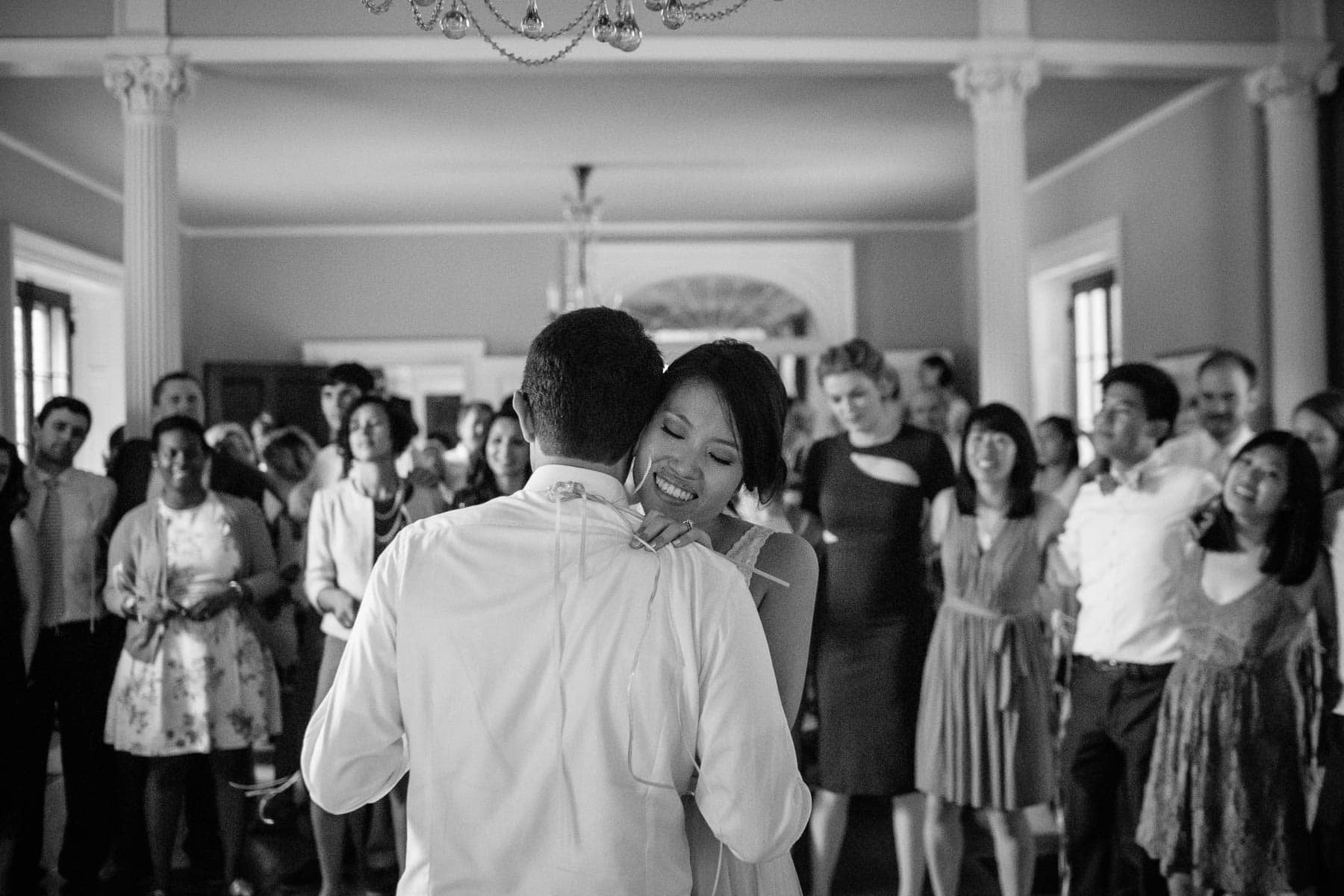 bride and groom dance in the ballroom of the Lyman Estate