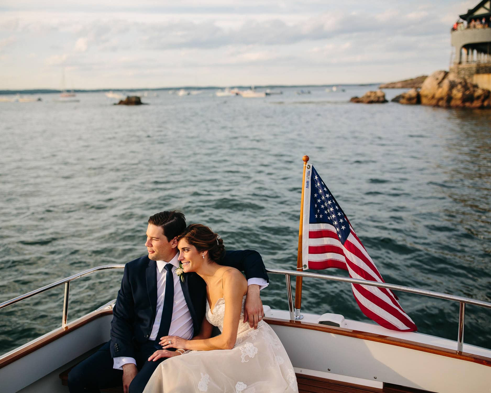 bride and groom enjoy sunset on the water at the Corinthian Yacht Club, Marblehead, MA | New England wedding photographer | Kelly Benvenuto Photography