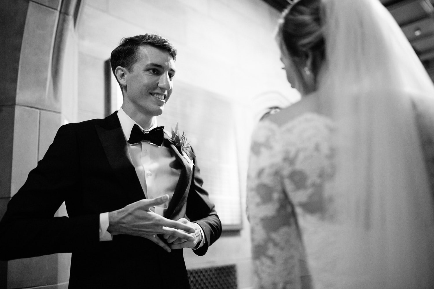 groom take ring off right hand